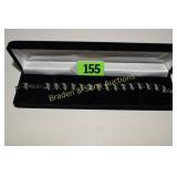 LADIES STERLING SILVER BRACELET WITH EMERALDS