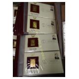 GROUP OF APPROX 125 - 22K GOLD PLATED US STAMPS