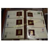 GROUP OF APPROX 150 - 22K GOLD PLATED US STAMPS