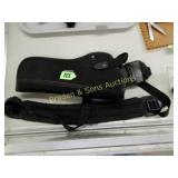 PISTOL HOLSTER WITH CARRYING STRAP