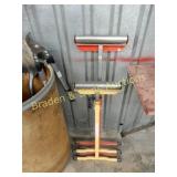 GROUP OF 2 METAL STANDS WITH ROLLERS