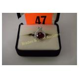 LADIES STERLING SILVER AND RED GARNET RING