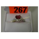 LADIES STERLING AND RED TOPAZ HEART RING. SIZE 7