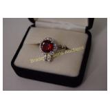 LADIES STERLING SILVER AND RED GARNET RING