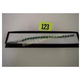 LADIES STERLING SILVER AND GREEN TOPAZ BRACELET