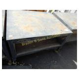 USED PORTABLE HEAVY DUTY WORK TABLE.