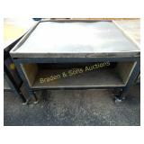 USED PORTABLE HEAVY DUTY WORK TABLE.