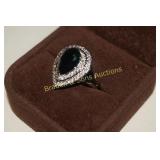 LADIES STERLING SILVER AND EMERALD RING. SIZE 7