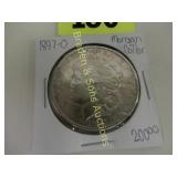US 1897-O MORGAN SILVER DOLLAR. AU QUALITY