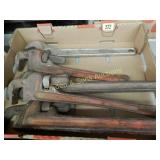 GROUP OF 4 PIPE WRENCHES AND ONE CRESENT WRENCH