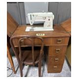 Singer Sewing Machine in Wood Cabinet, w/Chair