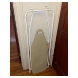 Door hung ironing board