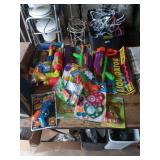 Assorted water guns and toys