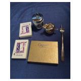 Playing cards and covered dishes