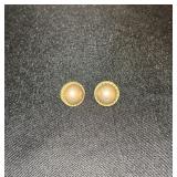 Gold colored earrings