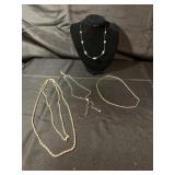 Silver colored necklaces