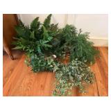 Artificial greenery in brass containers