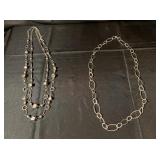Silver colored necklaces