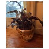 Planter with artificial plant