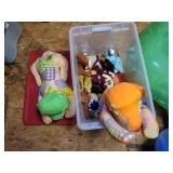 Storage bin with lid and stuffed animals