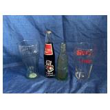 Coke bottles and glasses