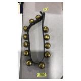 STRING OF 12 BRASS BELLS