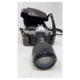 CANON AE-1 CAMERA WITH LENSE