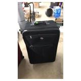 AMERICAN TOURIST MEDIUM SIZE SUITCASE