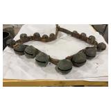 STRING OF ANTIQUE GRADUATED SLEIGH BELLS