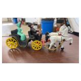 CAST IRON RIDER ON CARRIAGE