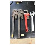 4 ASST SIZE ADJUSTABLE PIPE WRENCHES