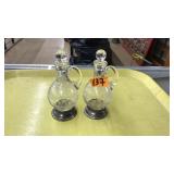 PAIR OF STERLING RIMMED GLASS CRUETS