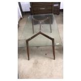 CONTEMP. GLASS TABLE WITH TEAK LEGS