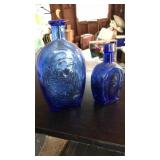 2 BLUE GLASS FLASKS: EAGLE & HORSESHOE