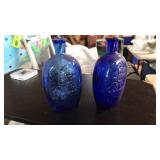 PAIR OF BLUE GLASS SHIP FLAKS