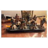 ORIENTAL 'MUD MEN' FIGURALS ON STAND