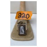 VINTAGE CARVED METAL PENDANT