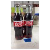 2 MINI COCA COLA BOTTLES UNOPENED