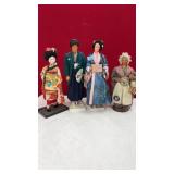 4 VINTAGE DOLLS ON STANDS