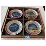 SILVER RIMMED PLATES IN DISPLAY