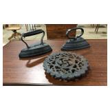 2 SAD IRONS & CAST IRON TRIVET