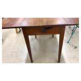 ANTQ. DROP LEAF TABLE WITH CENTER DRAWER
