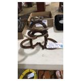 FOLK ART HORSE SHOES WELDED INTO FROG
