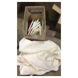 BOX OF ASST. TAPER CANDLES & TABLE CLOTH