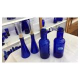 2 COBALT BLUE GLASS BOTTLES & HANDMADE CANDESTICKS