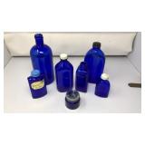 (7) VNTG BLUE GLASS MEDICINE BOTTLES