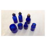 LOT OF SMALL COBALT BLUE GLASS BOTTLES