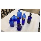 LOT OF COBALT BLUE GLASS BOTTLES