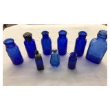 9 SMALL COBALT BLUE GLASS APOTHECARY BOTTLES