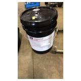 BUCKET OF HYDRAULIC FLUID